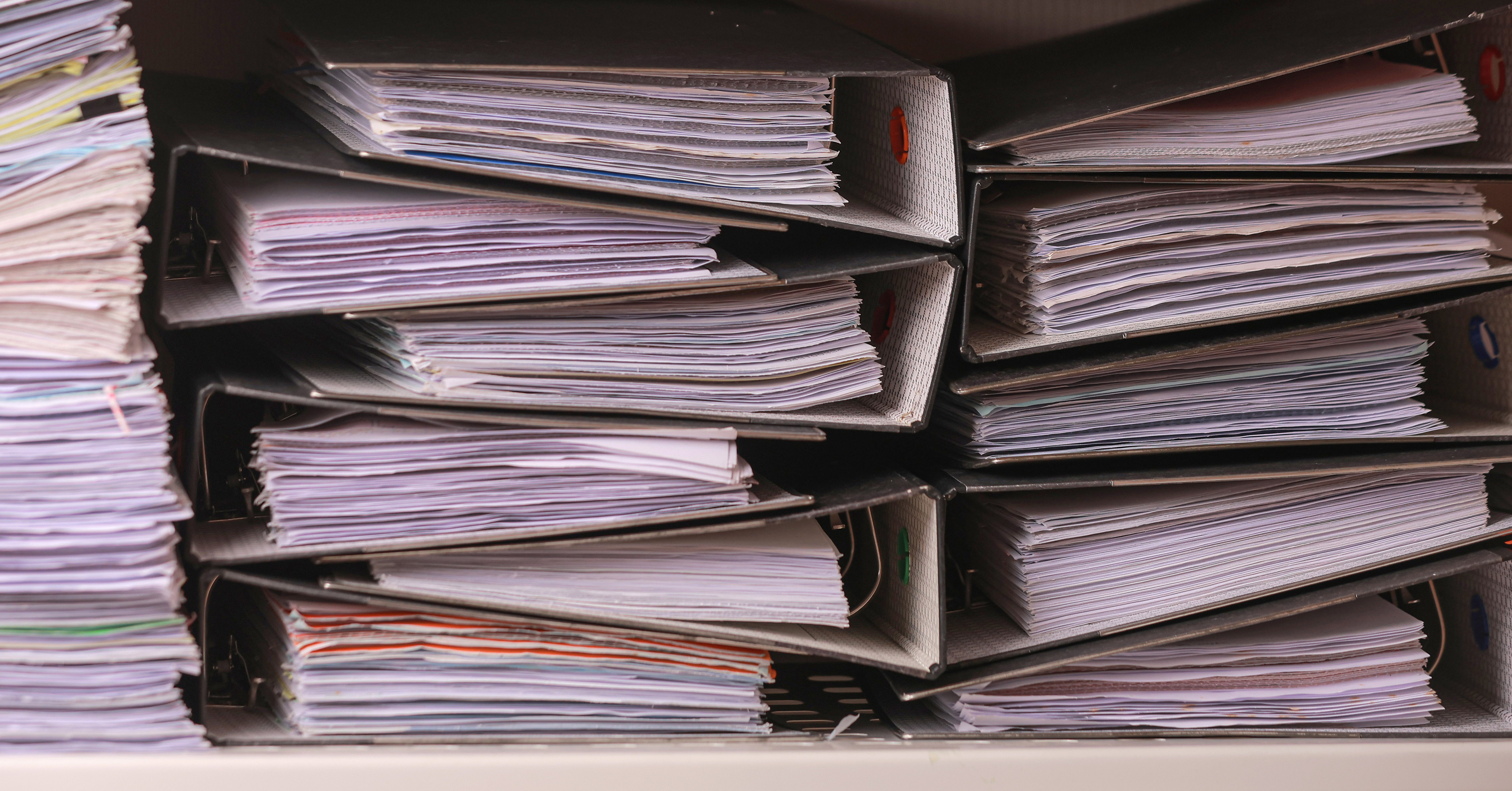 photo: stacked records and binders